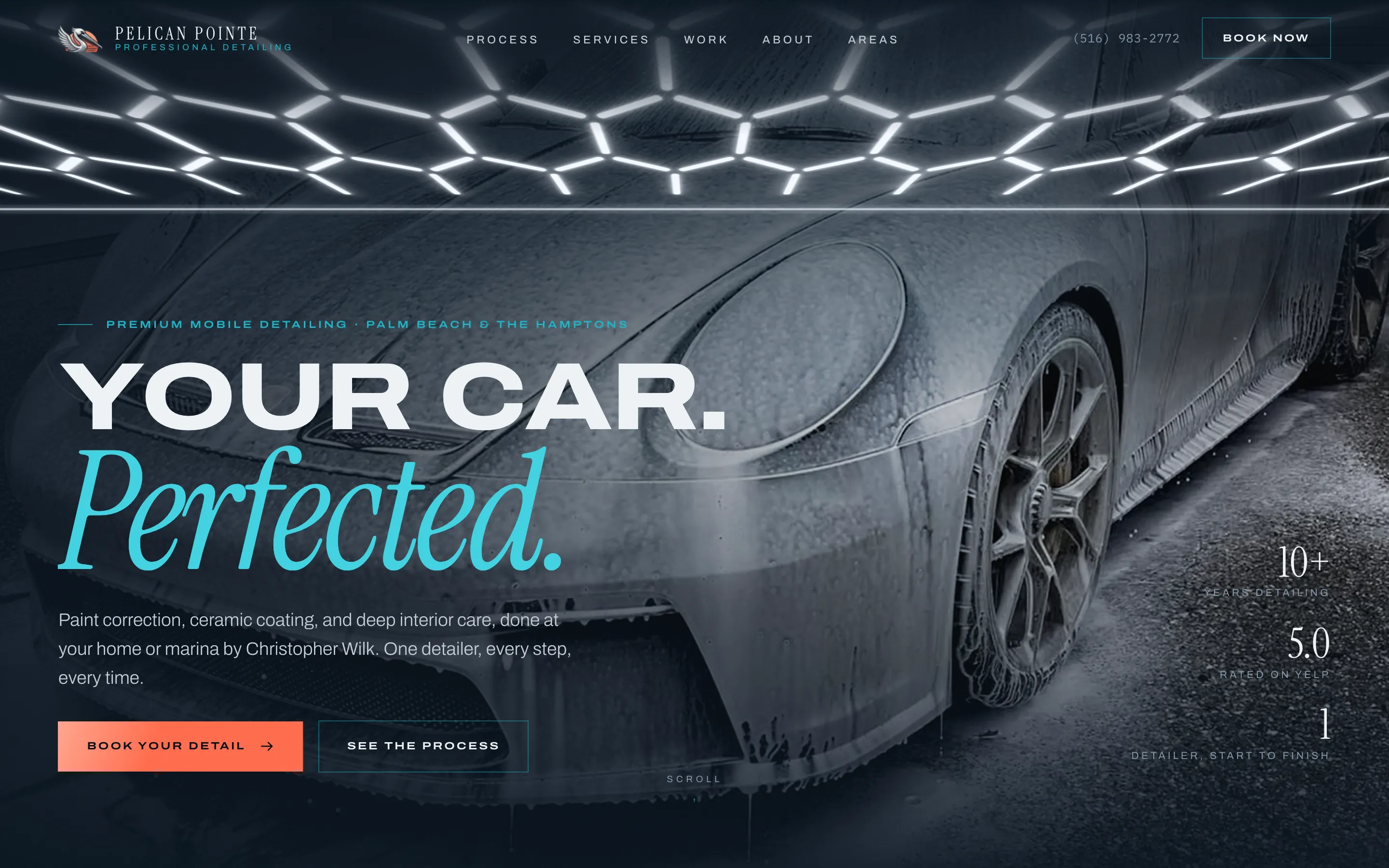 The Pelican Pointe homepage: a hexagonal LED ceiling light over a Porsche 911 in snow foam, and the headline Your car. Perfected.